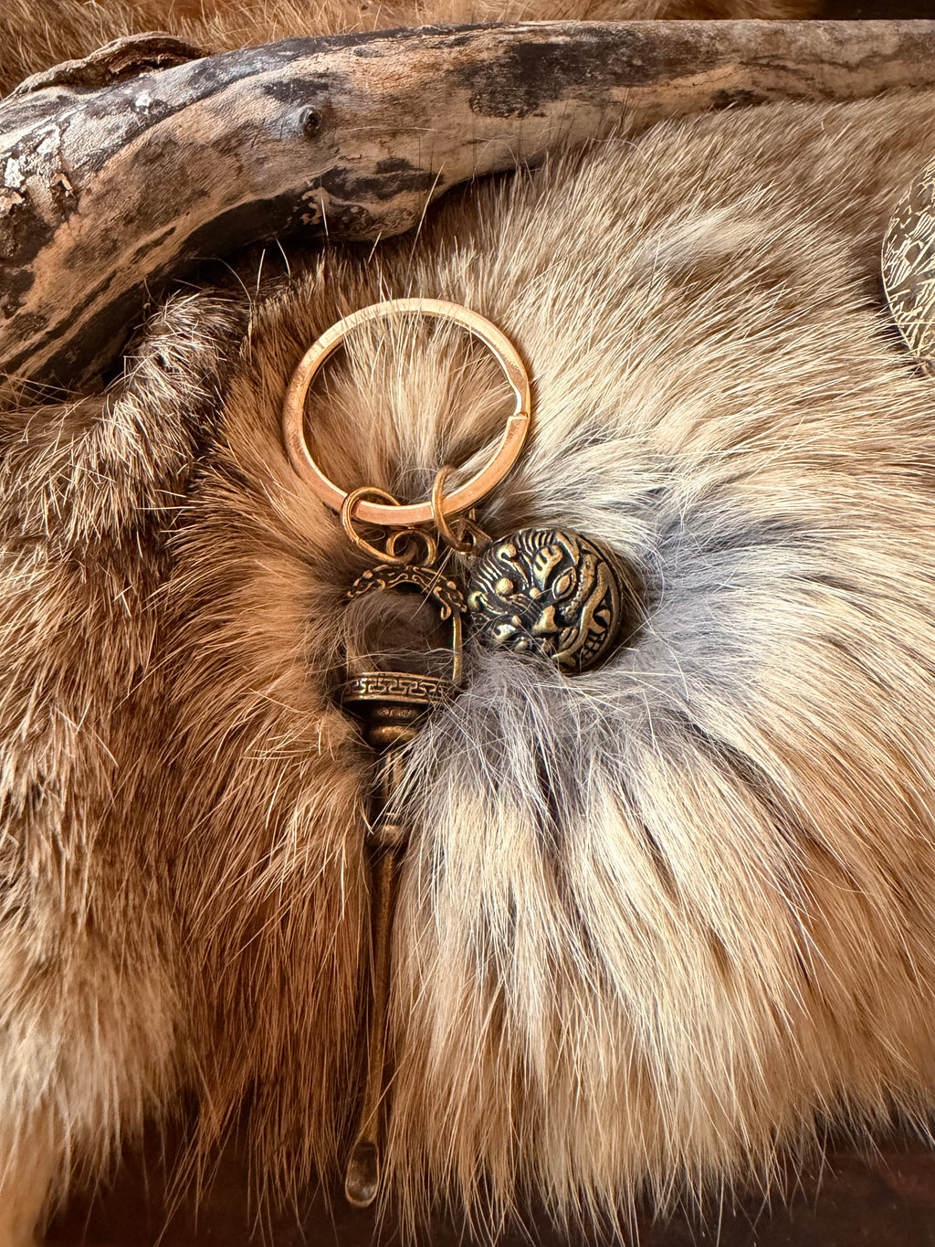Porte-clés traditionnel – Cuillère à tabatière & masque protecteur