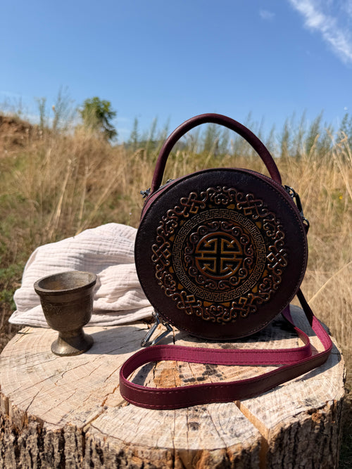 KHATAN – Sac rond en cuir repoussé