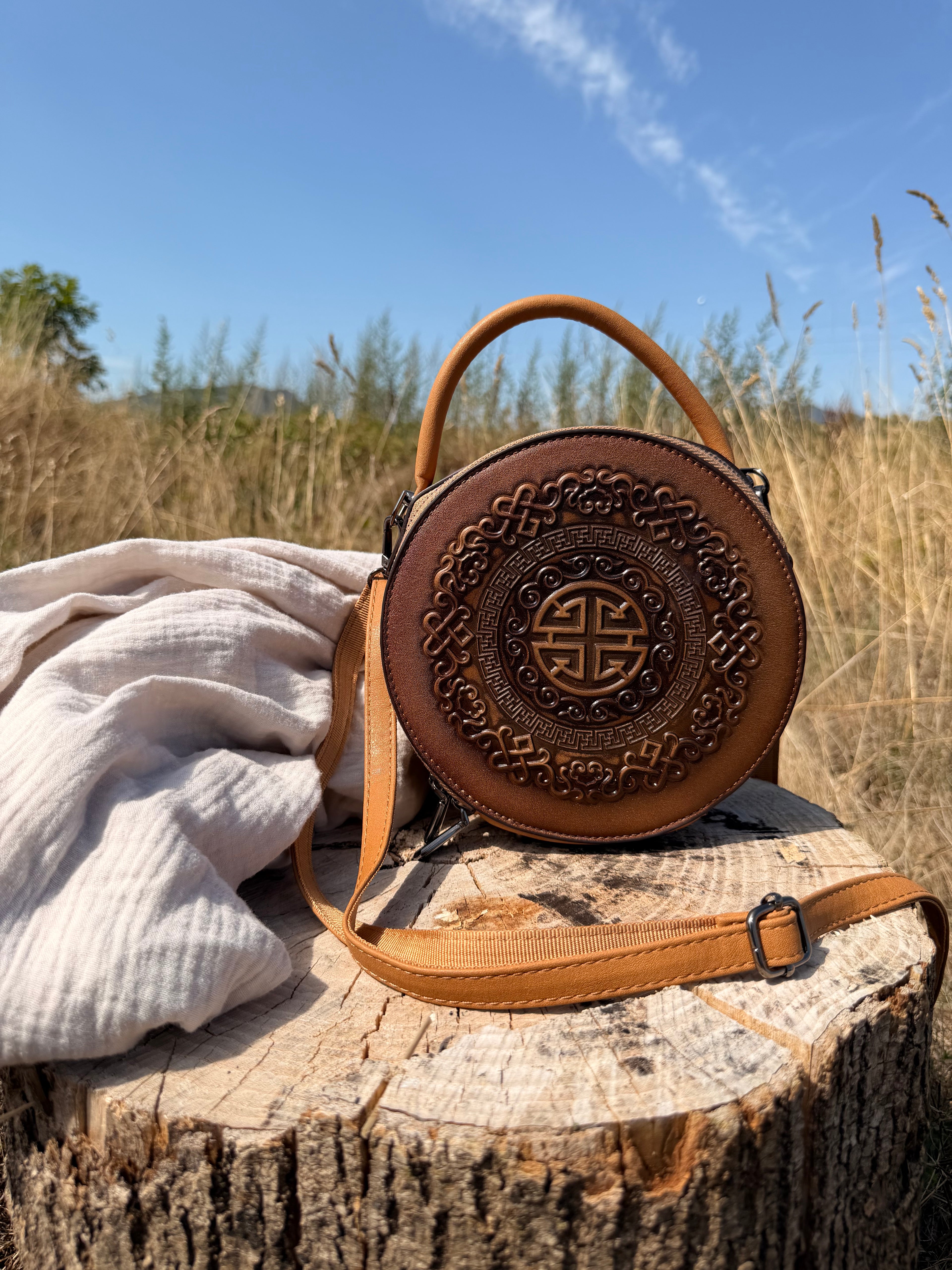Khatan – Sac rond en cuir repoussé