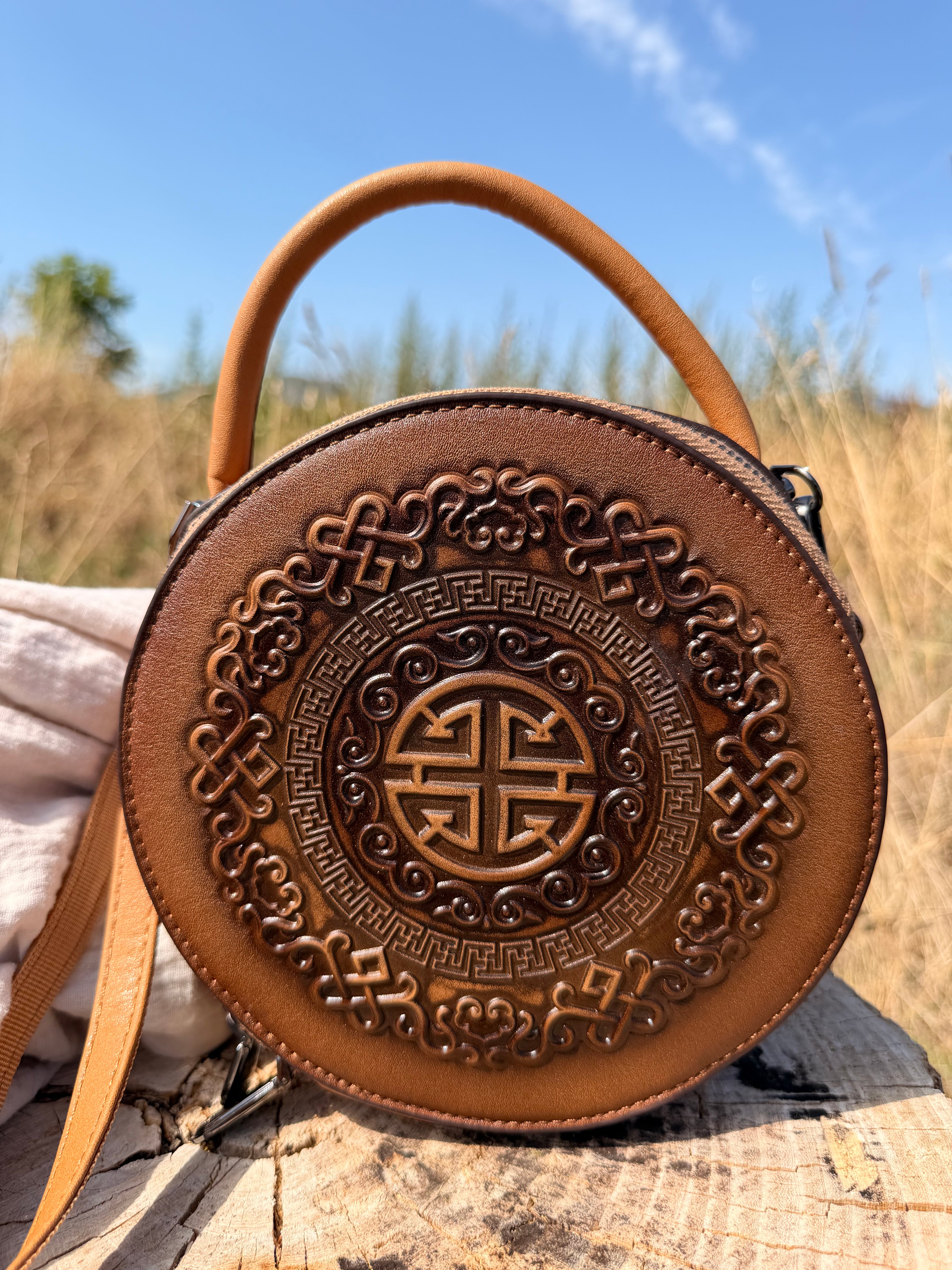 Khatan – Sac rond en cuir repoussé